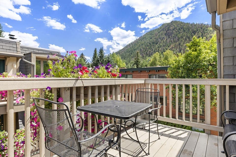 Enjoy Aspen Mountain views from your private deck, expansive windows, and top-floor location.