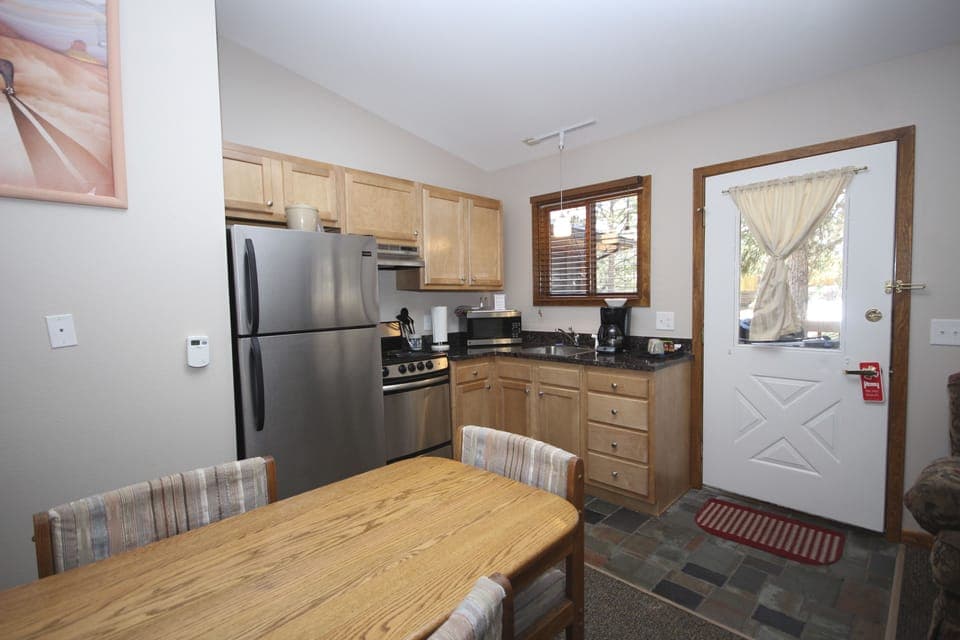 King One Bedroom Cabin | Private kitchen | Coffee/tea maker, fridge, microwave, cookware/dishes/utensils