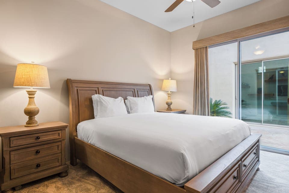 Bedroom 3 features a queen bed and an ensuite bathroom.