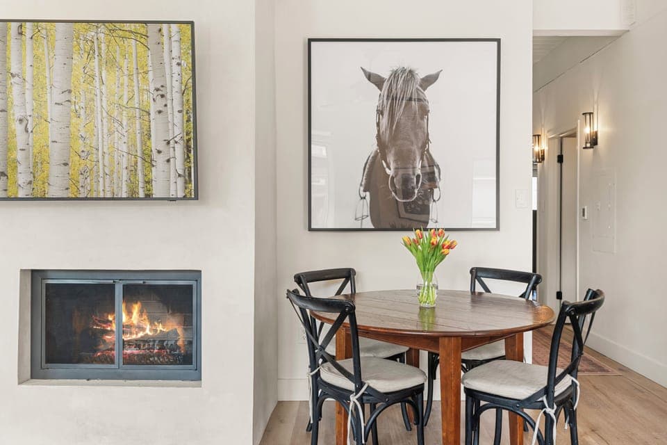 Spacious top-floor 3 bedroom, 2 bath condo with wood-burning fire and Aspen Mountain views in the Chateau Chaumont building.