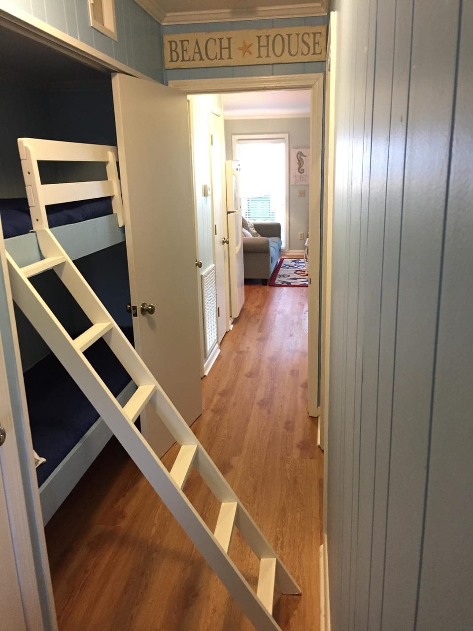 Available bunk beds with top safety rail and removable ladder. 