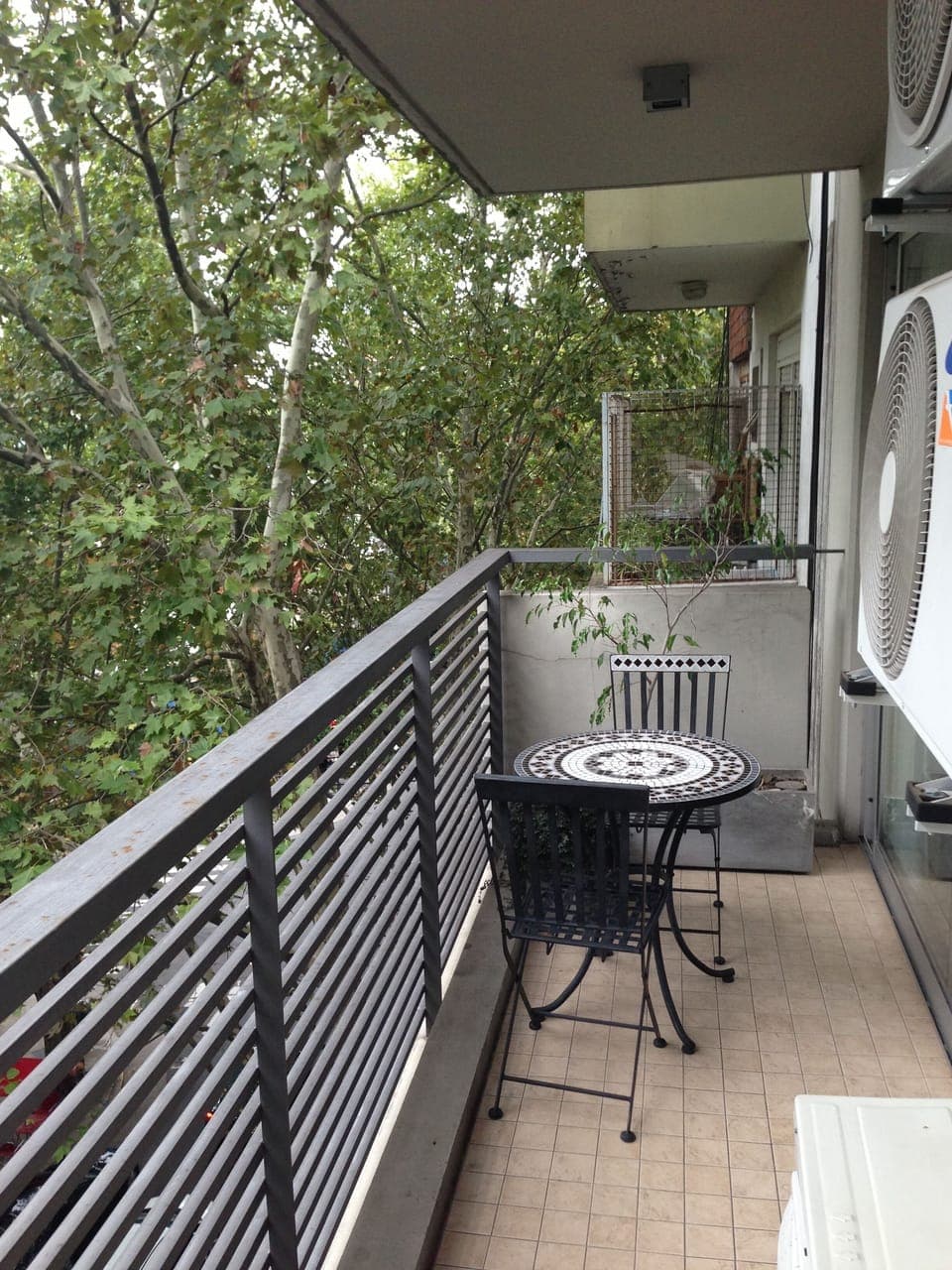 5th floor private balcony accessed by both living room and the bedroom