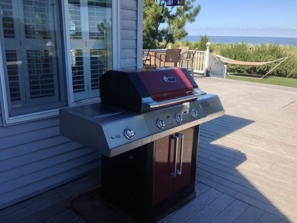The gas grill is big enough for a family feast and has a pot burner on the side