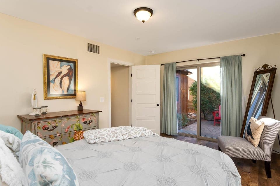 A spacious bedroom with an outdoor patio for your privacy and enjoyment.