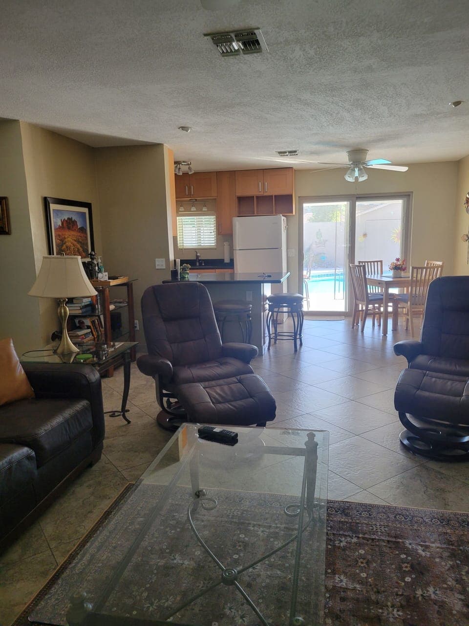 View from Living Room to Kitchen, Dining Table and Pool Area