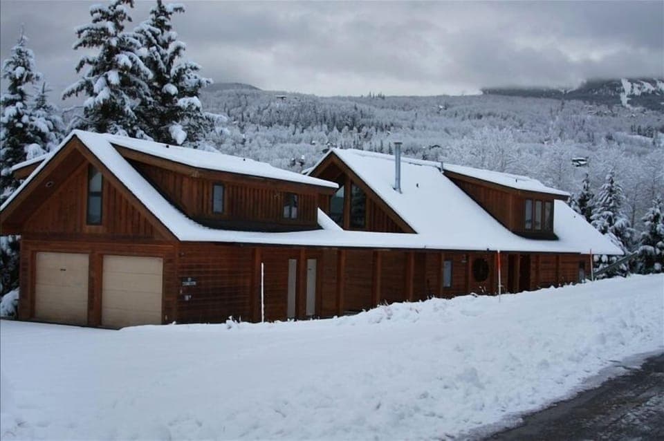 Front of Newhard Chalet in snow