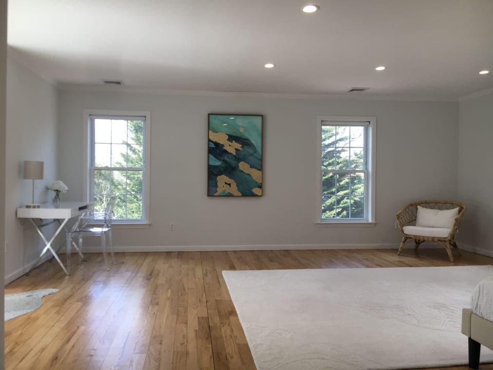 Large master suite with king size bed, walk-in closets, desk & en-suite bathroom
