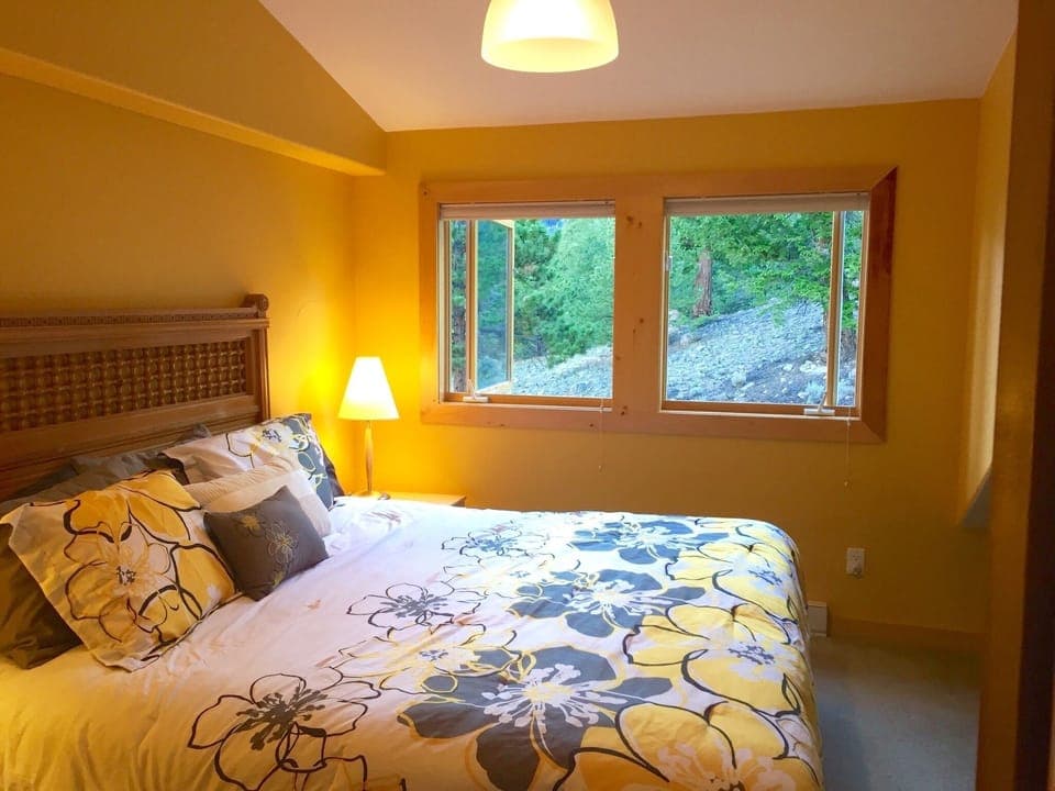 Yellow Family Room has views of Twin Peaks includes king bed and bunk beds