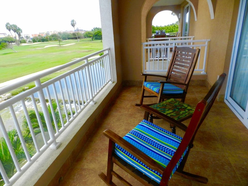 One of 2 balconies downstairs overlooking the golf course and stream