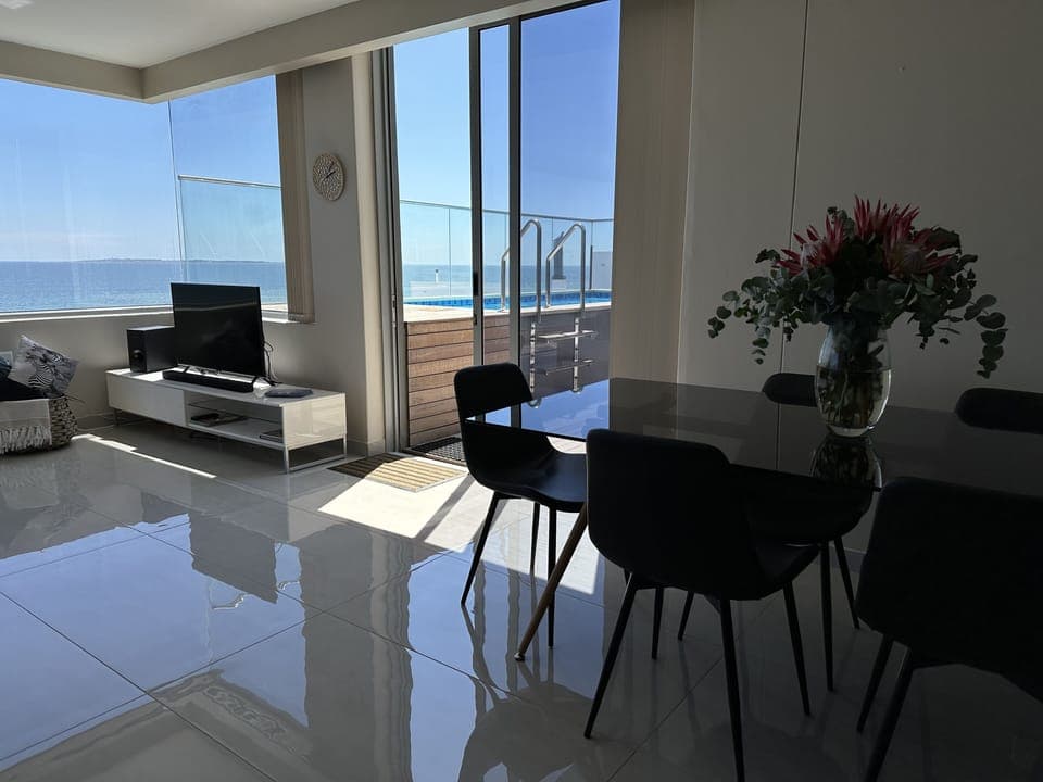 Lounge looking out to private pool on patio