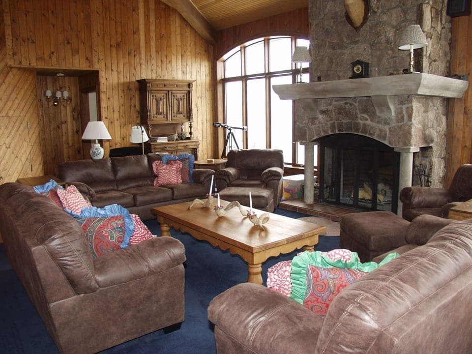 Great Room with new leather couches and big screen TV