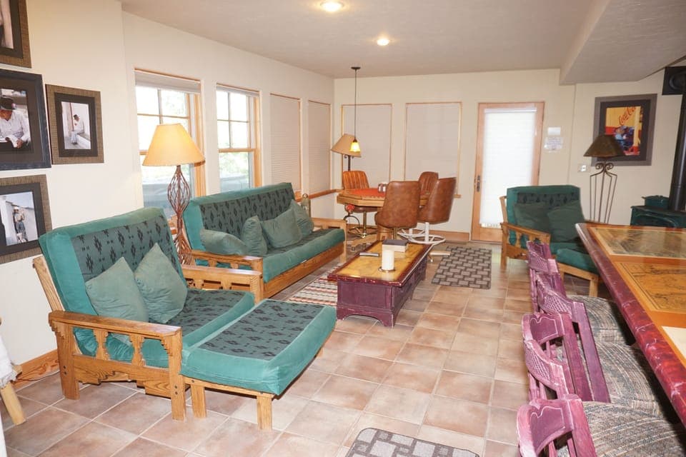 Media Room with double futon bed and 2 single futon beds