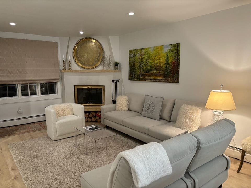 Living room with log fire place