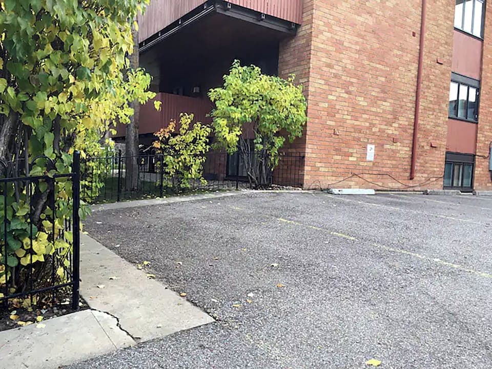 Two dedicated off-street parking spaces off alley.